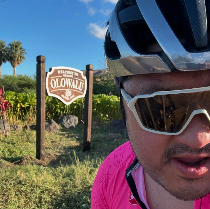 A photo of Hyun in front of the Olowalu sign